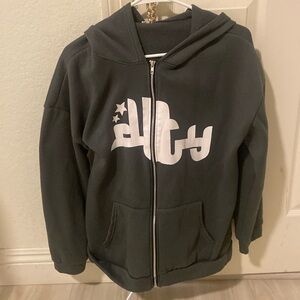 zip up grey jacket!! size large!! doesn’t name brand so sorry!!